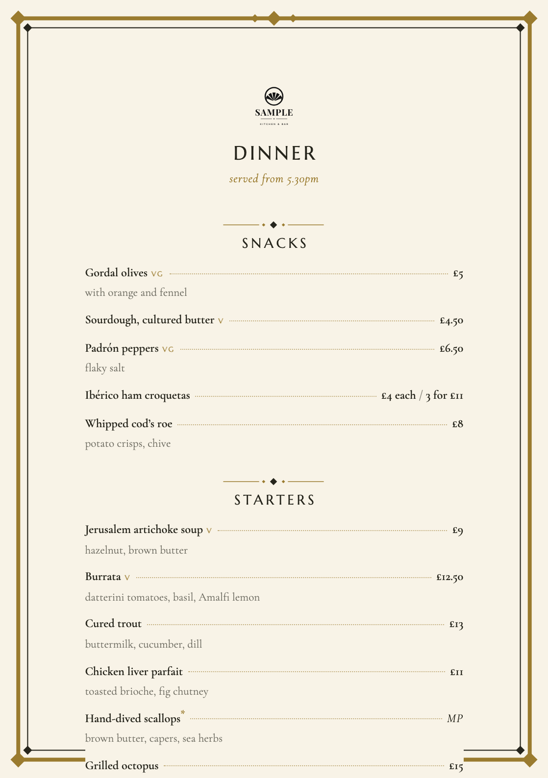 A dinner menu set in the Odeon template — a drawn deco frame, brass and cream